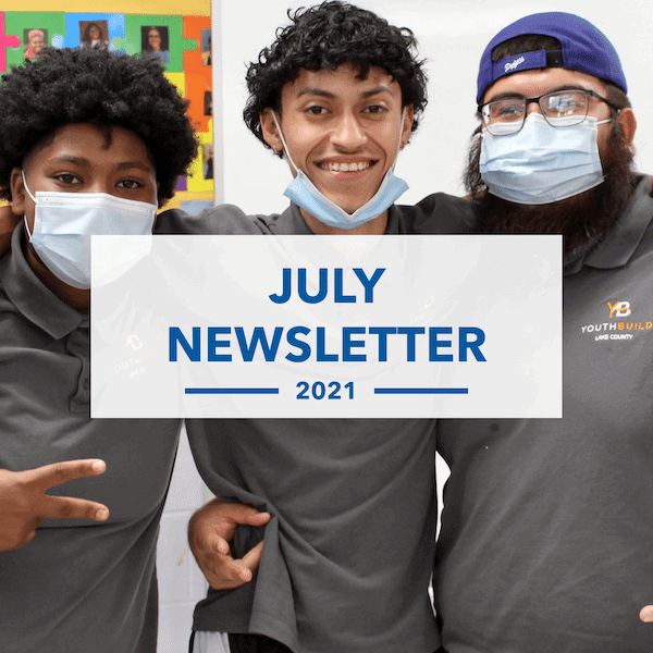 Three people wearing gray shirts and face masks smile and pose together indoors. The text “July Newsletter 2021” is centered over the image.